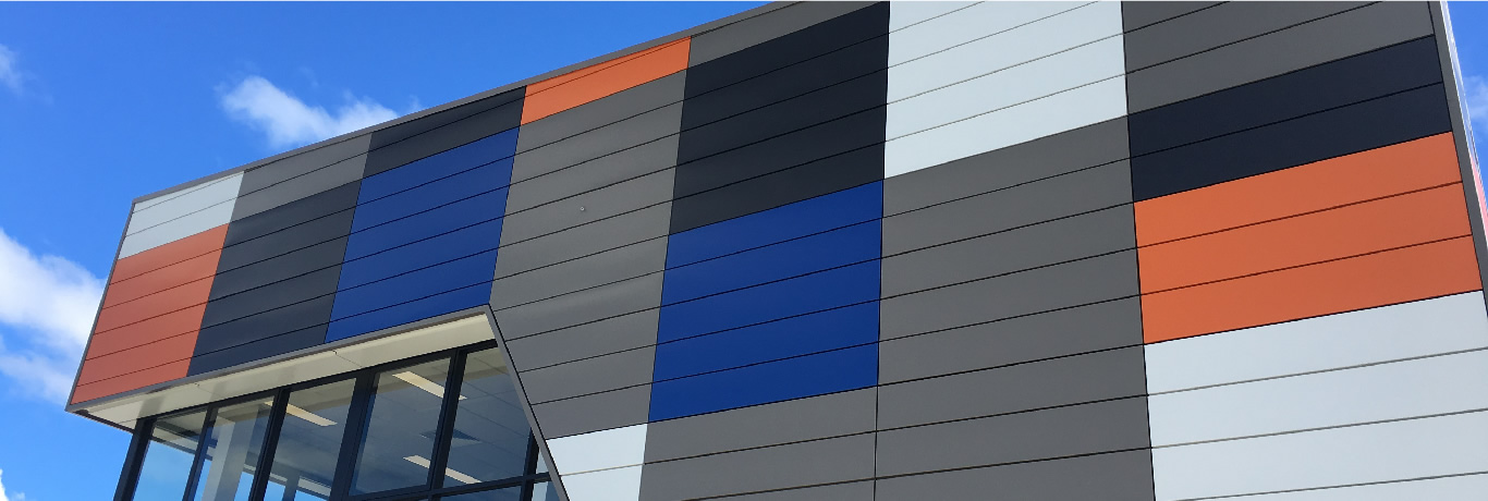 Cladding on the Metal Roofing and Building Supplies warehouse.